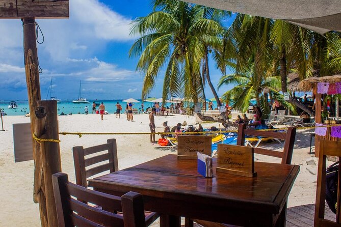 Discover Isla Mujeres: Catamaran, Snorkeling, and "Ice Bar" - Snorkeling expectations: gear is included, sightings vary