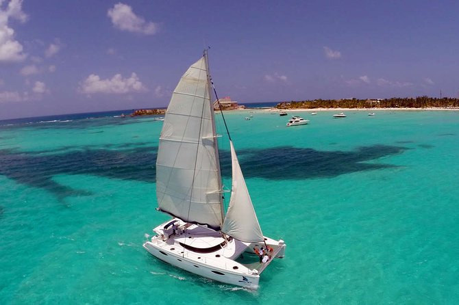 Discover Isla Mujeres tour with snorkel, buffet and open bar - Isla Mujeres Beach Club Time, Buffet Lunch, and Open Bar Reality