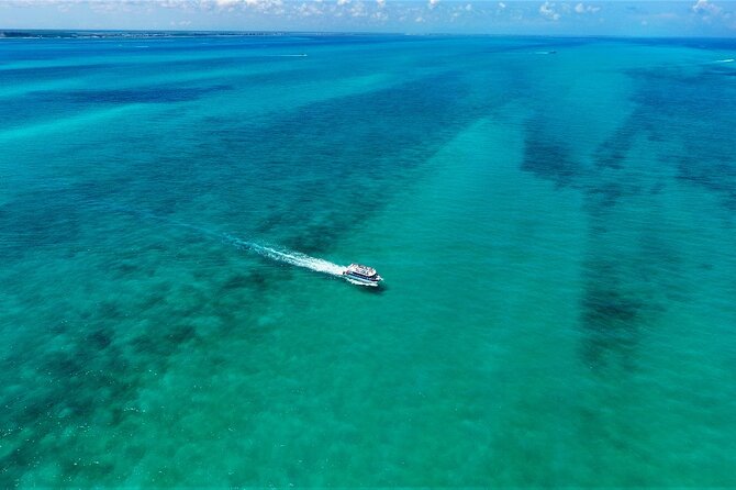 Discovering Isla Mujeres on a Double Decker Catamaran - Stop 1, the island rhythm: beach club vibes on Isla Mujeres