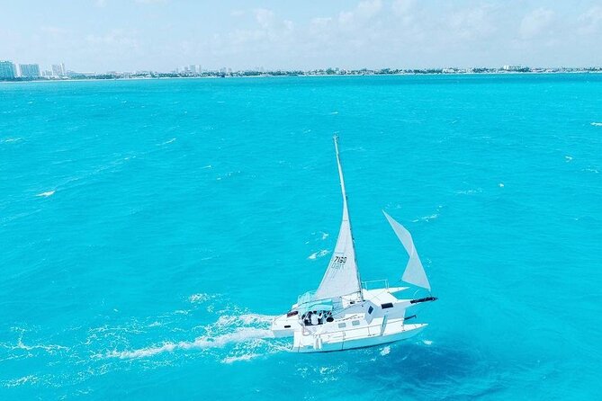 Exciting Catamaran Tour to Isla Mujeres, from Cancún! - Beach Club Lunch: Buffet Food, Shade, and That Ice Bar Moment