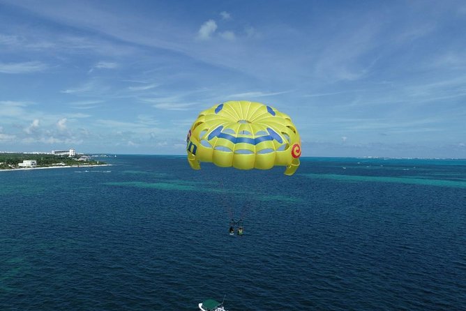 Fly Above Cancun Bay: Parasailing Experience - Getting there: hotel pickup, long drive, then a water taxi hop