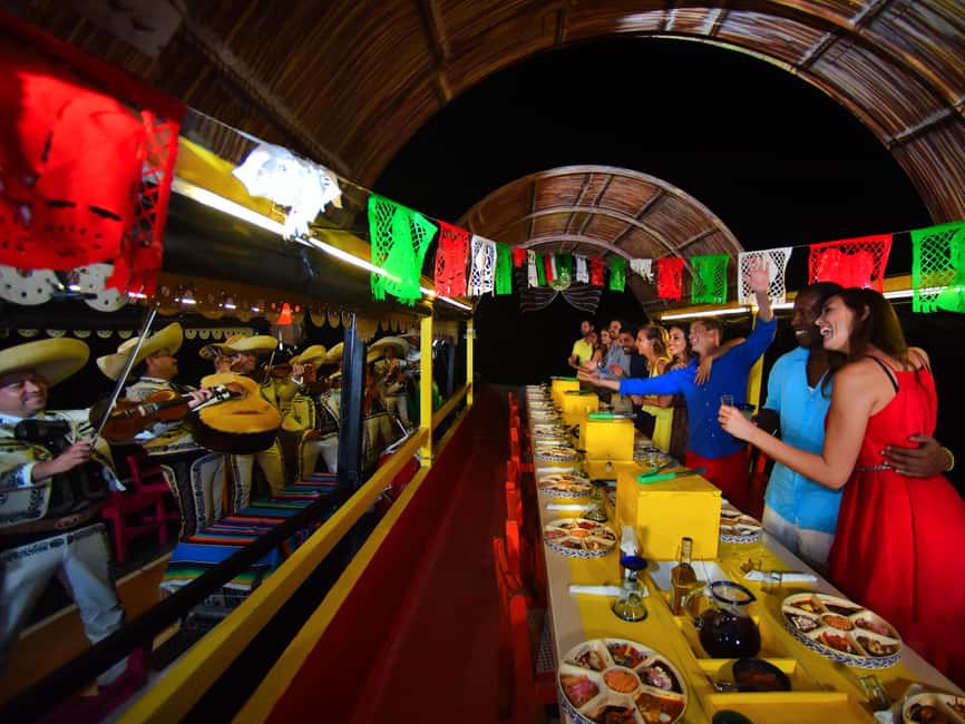 From Cancun: All-Inclusive Xoximilco Park Admission - Boarding and the trajinera ride through the canals