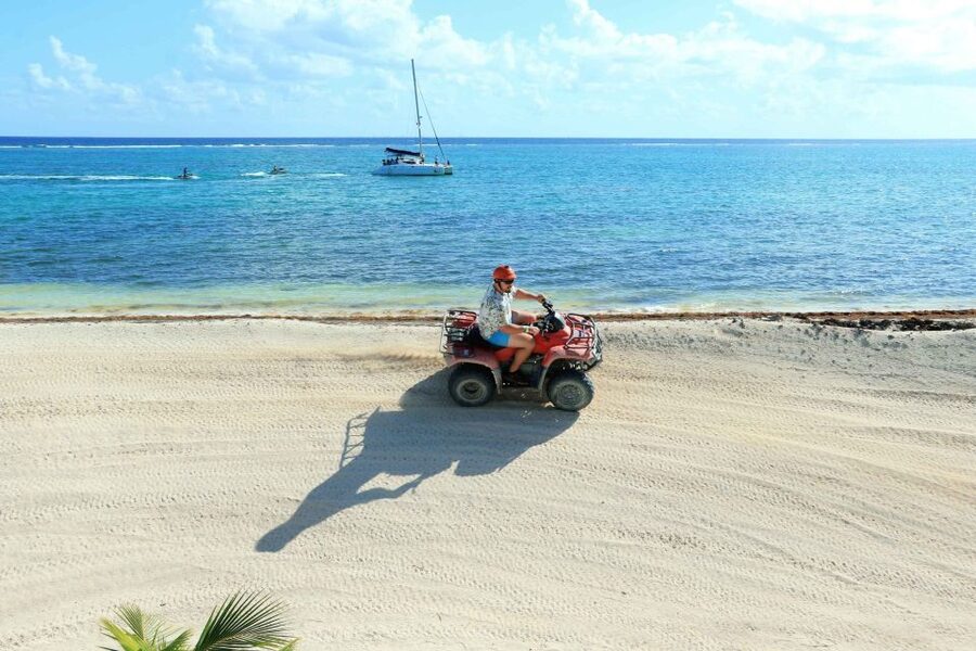From Cancún: ATV Jungle Trail Adventure and Beach Club - From Pickup to Safety Briefing: How the Day Starts