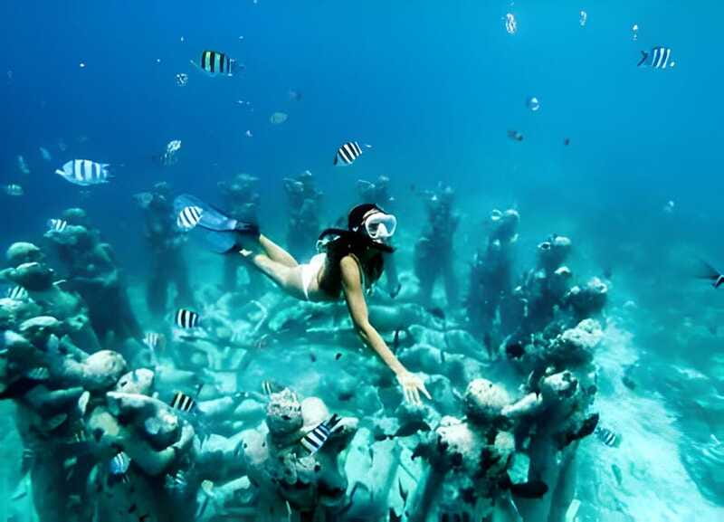 From Cancun: Isla Mujeres by Luxury Catamaran with Drinks - The Snorkeling Stop’s Tradeoff: Short Time Underwater