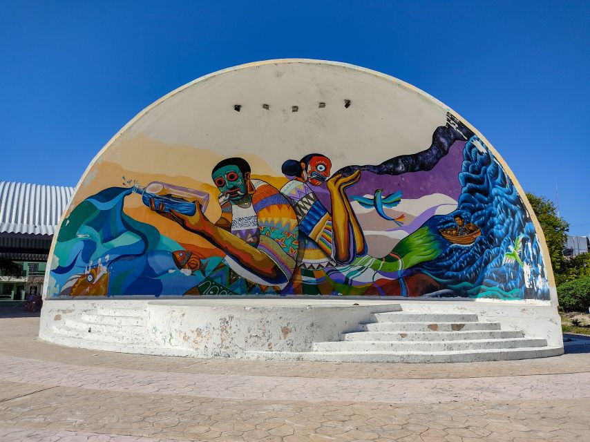 From Cancun or Puerto Morelos: Holbox Boat Tour with Lunch - Isla Holbox free time: murals, small streets, and beach walking