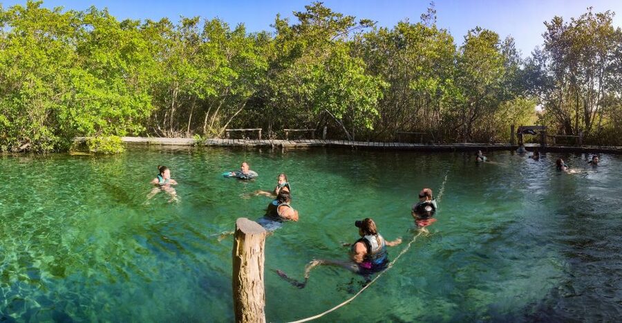 From Cancun or Puerto Morelos: Holbox Boat Tour with Lunch - Passion Island and the short break before swimming