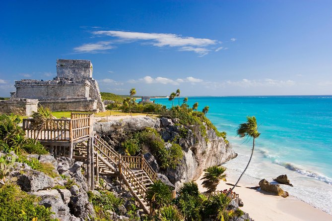 Full-Day Chichen Itza, Coba, cenote Ik Kil and Tulum Private Tour - Stop 1, Tulum: cliffs, the port vibe, and a quick tram