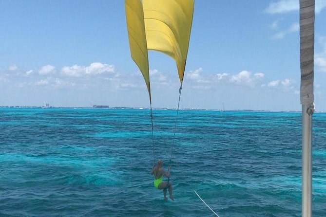Full-day Isla Mujeres All-inclusive Cruise from Cancún - Isla Mujeres private beach club: white sand, buffet lunch, and open bar