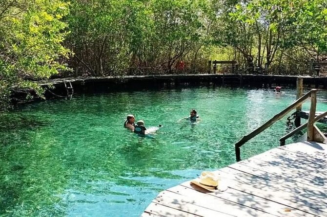 Full Day Tour of Isla Holbox and Isla Pasión with Cenote - Holbox Island time: beaches, bicycles, and sunset energy