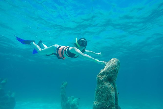 Half Day Sailing Private Catamaran to Isla Mujeres - Isla Mujeres Time: Choose Island Steps or North Beach Anchoring