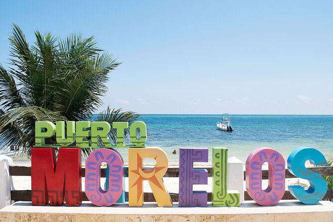 Hidden Cenote Swim & ATV Jungle Adventure with Transportation - Puerto Morelos town stop: snacks, wandering, and a more local pace