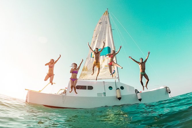 Isla Mujeres adventure by Catamaran. Snorkel, open bar and lunch - Walking the Island Town: Souvenirs Without Stress