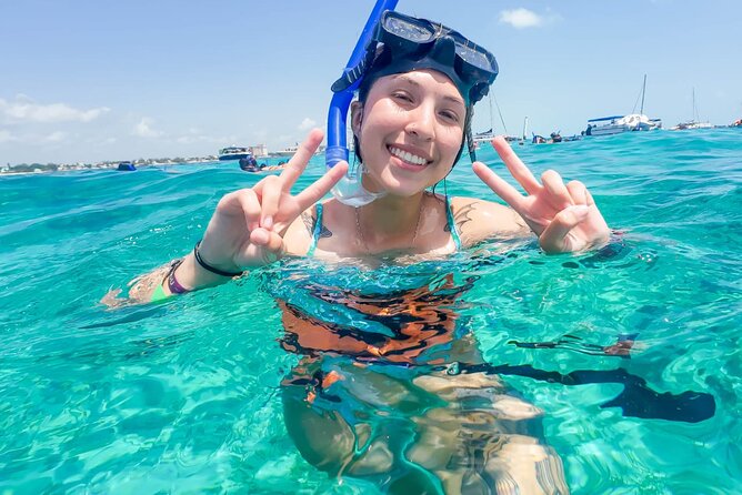 Isla Mujeres Basic Trip with Snorkel and Open Bar - Group size and guide language: small enough to follow, big enough to feel lively
