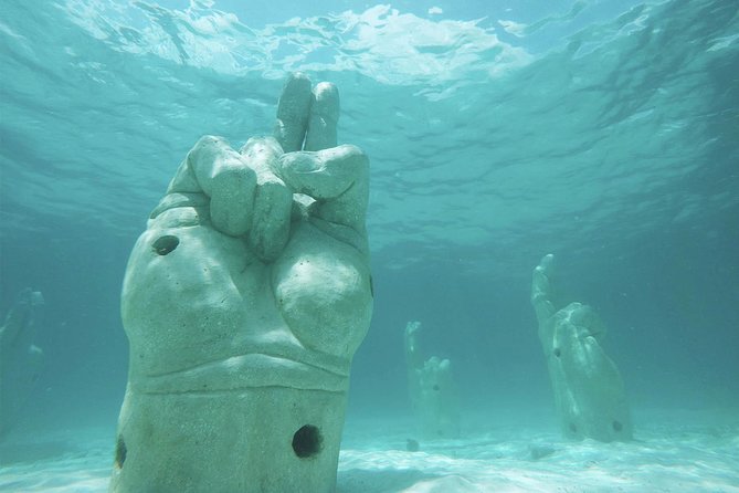 Isla Mujeres Catamaran Luxury Sailing Experience - Punta Sur and Ixchel: short visit, big views, quick photo time