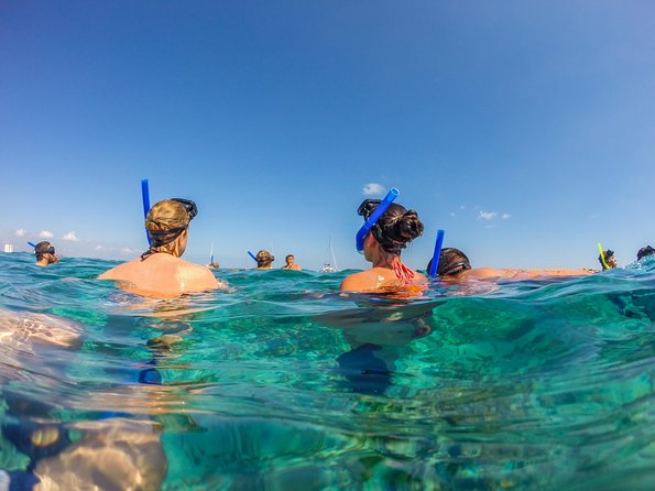 Isla Mujeres Catamaran, Open Bar & Optional Buffet and pick up - The Catamaran Ride: Comfort, Shade, and Open Bar Energy