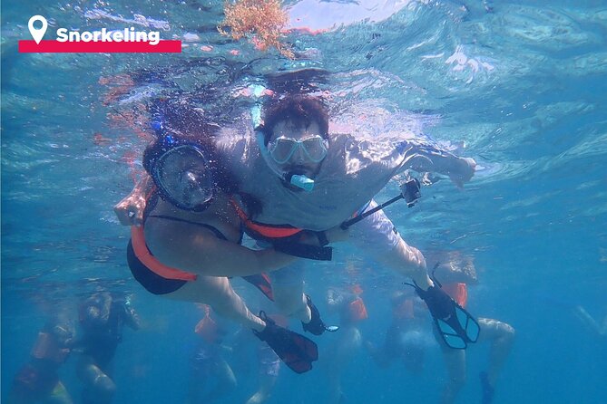 Isla Mujeres Catamaran + Snorkel + Open Bar on board + Buffet - Crowd size, timing slips, and tipping pressure