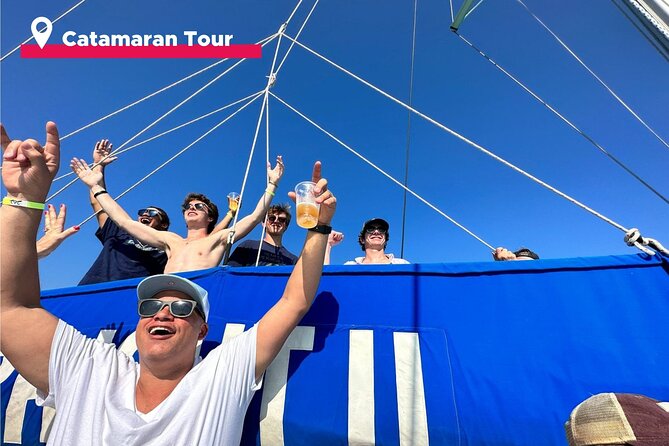 Isla Mujeres Catamaran + Snorkel + Open Bar on board + Buffet - The catamaran ride: open bar energy and a few weather surprises
