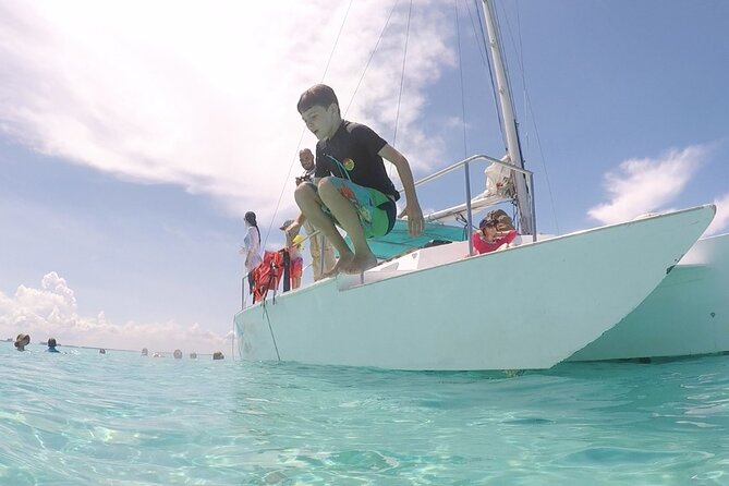 Isla Mujeres Catamaran Tour from Cancun with snorkel and Open Bar - One Hour of Free Time in Isla Mujeres: Playa Norte on a Tight Clock