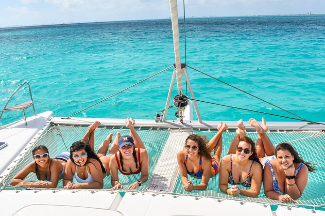 Isla Mujeres Catamaran Tour with Snorkel, Open bar and Transport - Crew energy and guide style: where the day truly succeeds