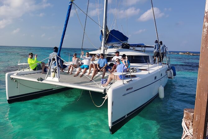 Isla Mujeres: Catamaran Tour with Snorkeling Food, Drinks, Beach - Getting to the Catamaran: El Pececito Meeting Point