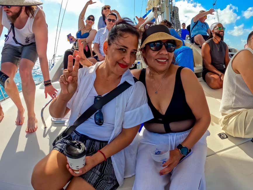 Isla Mujeres Catamaran Tour with Snorkeling & Open bar - Weather matters, so pick your attitude