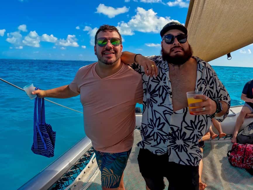 Isla Mujeres Catamaran Tour with Snorkeling & Open bar - Isla Mujeres lunch and free time, food plus wandering breaks