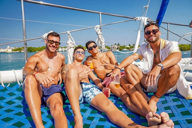 Isla Mujeres Cruise with Beach Club, Snorkel, Lunch and Open Bar - Lunch buffet and beach-club style stops: included, but manage expectations