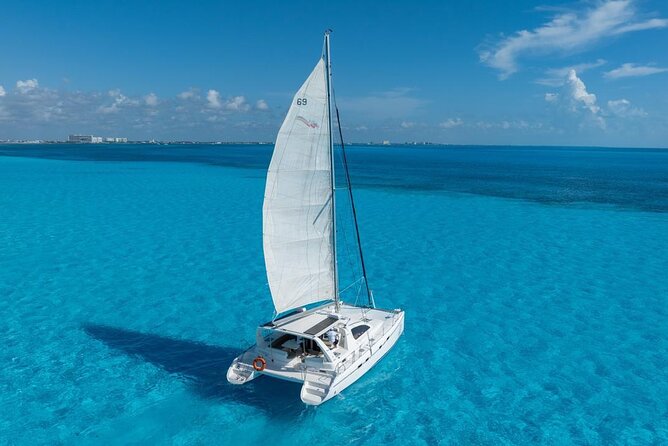 Isla Mujeres Day Tour with Catamaran, Snorkeling & Beach Club - Getting to Marina Las Perlas and surviving busy dock energy