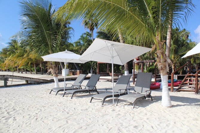 Isla Mujeres Day Tour with Catamaran, Snorkeling & Beach Club - Photo packages, towels, and sunscreen: small costs that matter