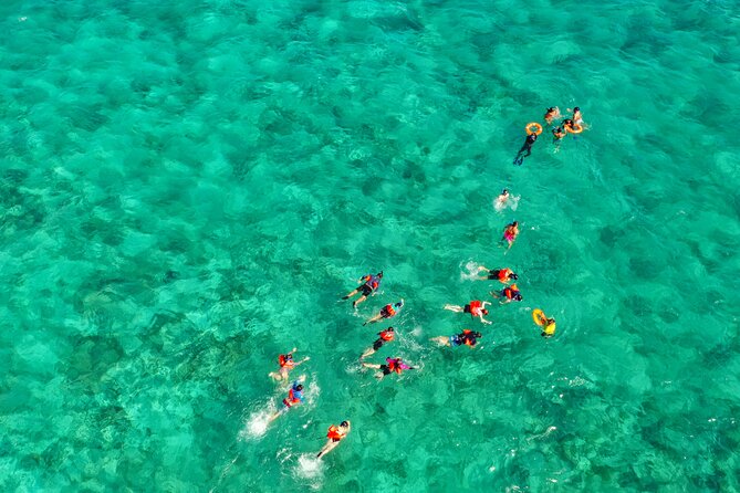 Isla Mujeres Island and Snorkeling Tour - Isla Mujeres Beach Club, Buffett Lunch, and the Open Bar Boost
