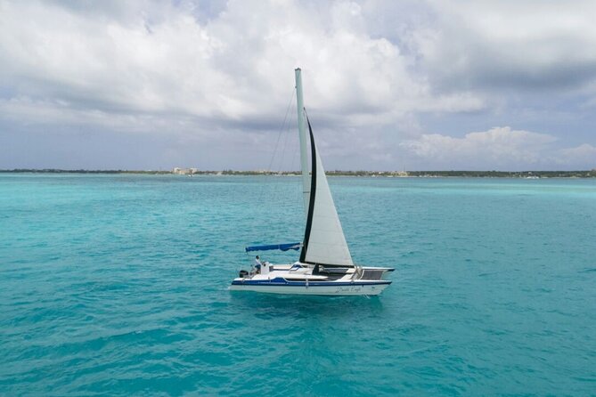 Isla Mujeres Premium Tour in Catamaran with Snorkel and Buffet - Playa Norte on Isla Mujeres: swimming, shopping, and that postcard time