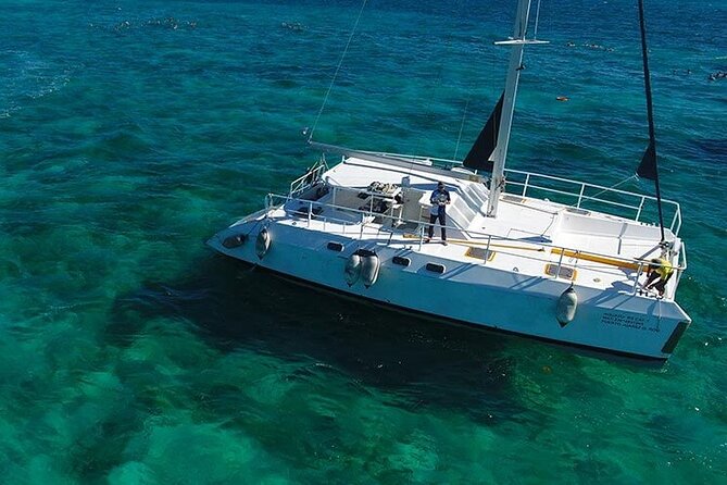 Isla Mujeres Premium Tour Transportation & Dock fee Included - Catamaran cruise with open-bar style drinks