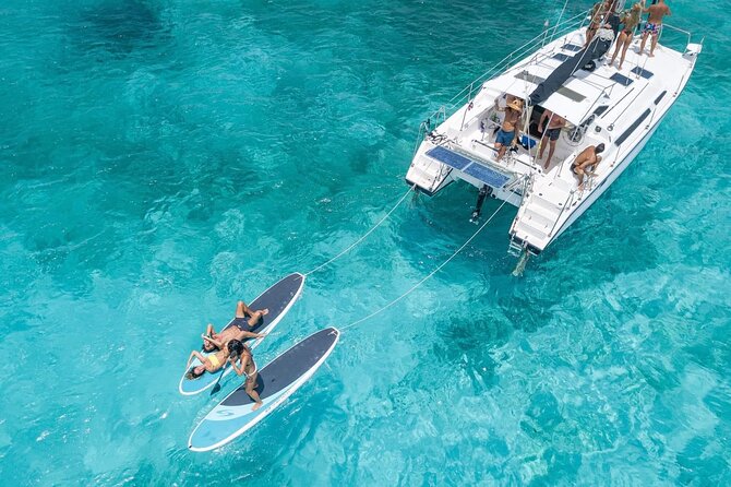Isla Mujeres Private Catamaran, Cruising, Snorkeling having Fun!! - Stop 2 at Kin Ha (Antes Parque de los Suenos): anchor time, cold drinks, and music