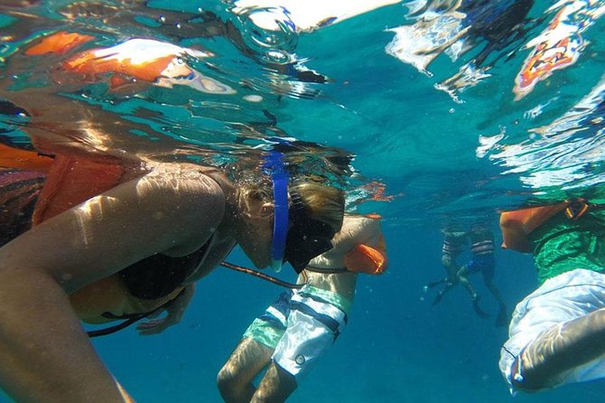 Isla Mujeres, Snorkel, Lunch & Pick Up from Cancun to P.Morelos - Lunch at the beach club and that Mayan-style BBQ payoff