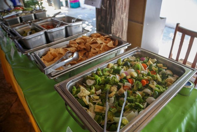 Isla Mujeres tour from Cancún (open bar, lunch ) - Weather Rules Your Day, So Pack Like It Does