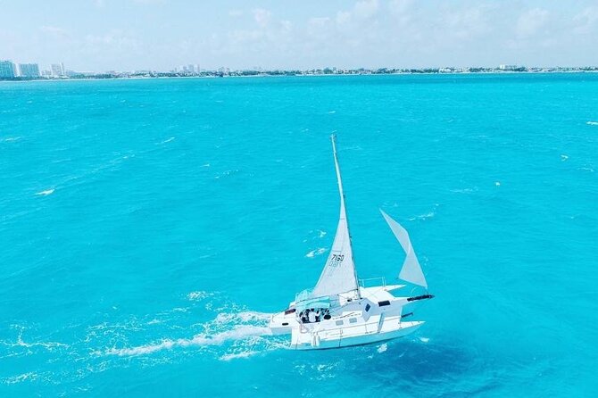 Isla Mujeres Tour in Private Catamaran with Snorkel and Lunch - Playa Tortugas check-in: where the day starts and how it flows