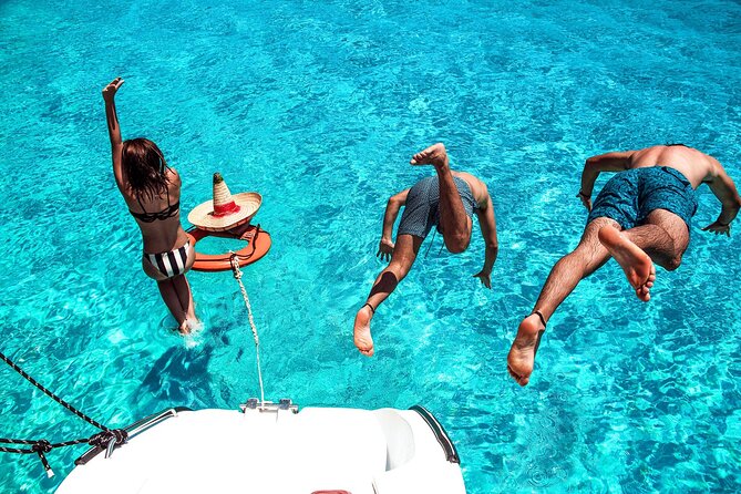 Isla Mujeres Tour on Catamaran with Snorkel, Open Bar, Buffet & Beach club - Isla Mujeres arrival: walking time without a guide