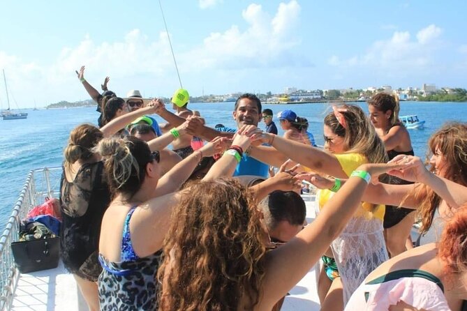 Isla Mujeres Tour with Open Bar Food and Snorkeling - Cruising the Nichupte lagoon channel on a two-level catamaran