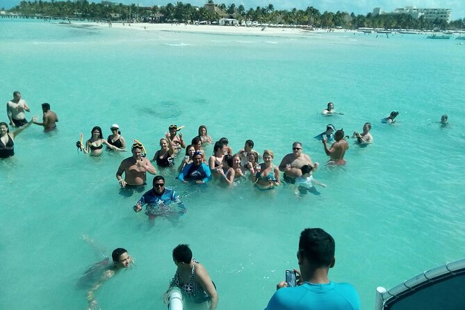 Isla Mujeres Unlimited! enjoyable party with transportation - On-Board Open Bar, Games, and the Sunset Return