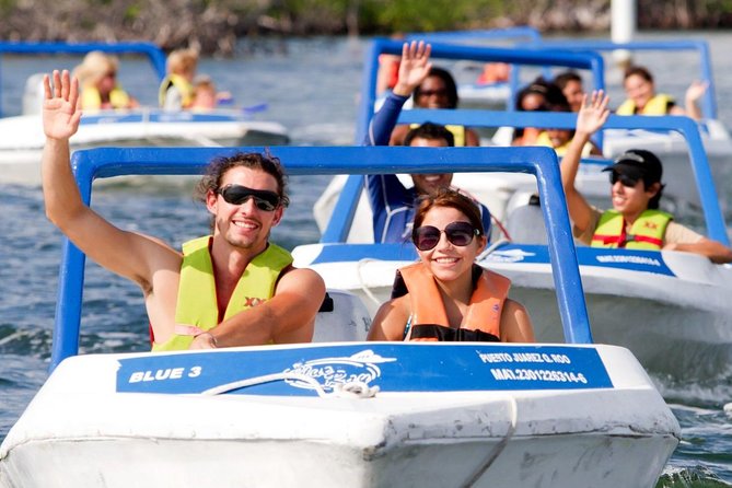Jungle Tour In Cancun, drive a speedboat through the lagoon with your companion - Step Two: Punta Nizuc Snorkel, Fish Variety, and the Underwater Museum Segment