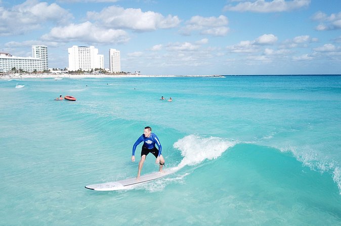 Learn to Surf in 1 Easy Lesson in Cancún - What’s Included: Gear, Rash Guard, Shade, and Bodyboards