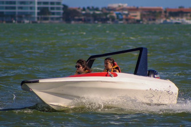 Live the experience of driving an Speedboat & Snorkel in CANCUN - Laguna Nichupté stop: mangroves, canals, and wildlife time