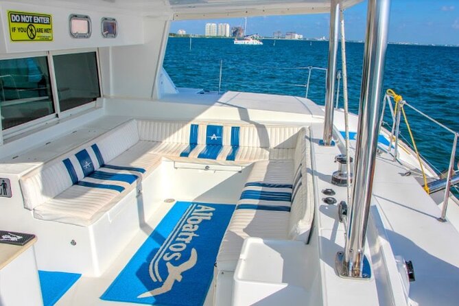 Luxury Catamaran Tour to Isla Mujeres with Transportation - Club Playa Mexico beach club: the BBQ buffet, open bar, and water toys