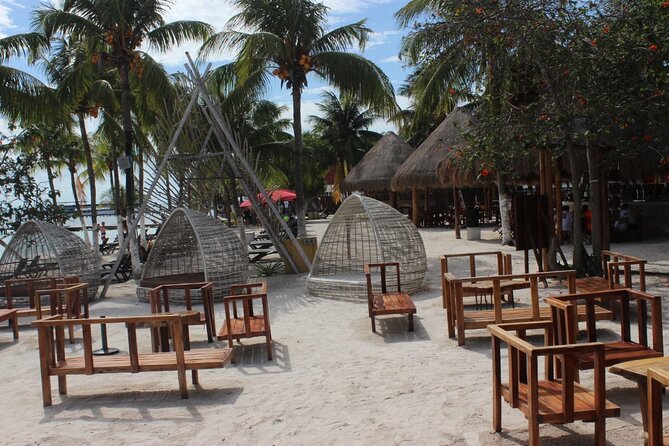 Luxury Catamaran Tour to Isla Mujeres with Transportation - The Isla Mujeres return: sunset sailing, music, and spinnaker when possible