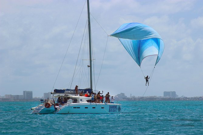 Luxury Catamaran tour to Isla Mujeres with transportation from Playa del Carmen - Onboard atmosphere: open bar, bilingual crew, and a real lunch plan