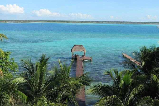 Magical BACALAR TOUR with Pontoon Boat ride. (Transportation + Breakfast + Food) - Balneario Marmol: an included water day stop you should not skip