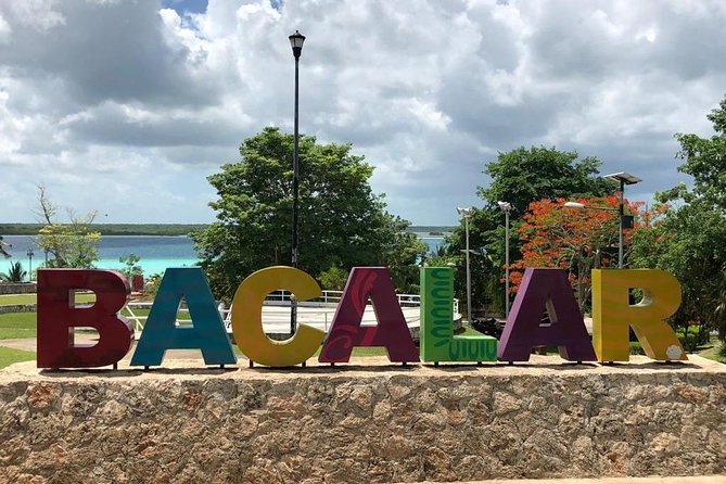 Magical BACALAR TOUR with Pontoon Boat ride. (Transportation + Breakfast + Food) - Bacalar Town lunch break: fort views, main square, and BACALAR letters