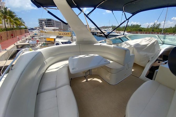 Playa Mujeres rent a Yacht 4hrs with Food and drinks aboard CA55 - The private-yacht feel: service that can handle real group needs