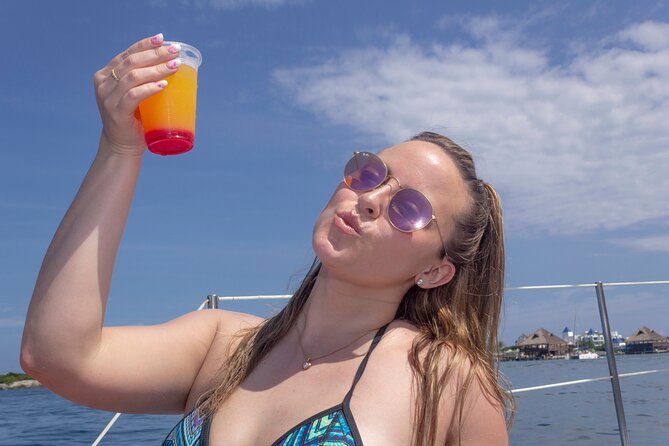 Premium Isla Mujeres Tour by Private Catamaran - Playa Tortugas return and open bar: where the fun relaxes