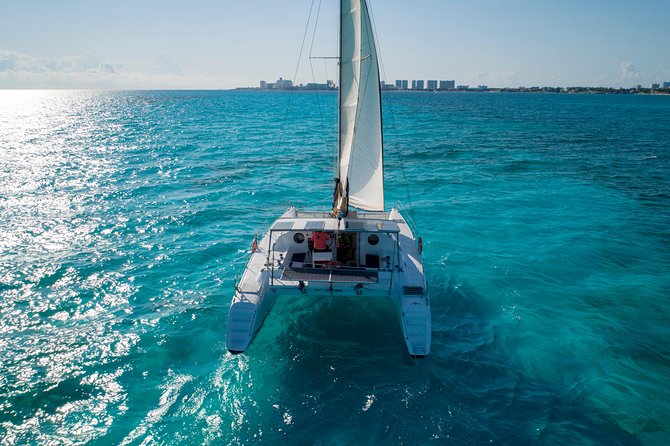 Private Catamaran from Cancun to Isla Mujeres | For up to 40 pp - Open Bar + Spinnaker “Fly”: The Party Elements That Actually Matter